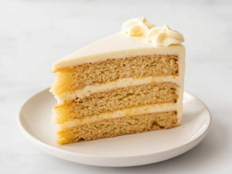 Sliced Eggnog Magic Cake showing three distinct layers