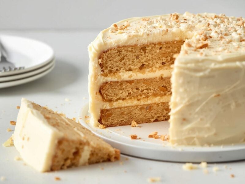 Sliced Eggnog Magic Cake showing three distinct layers