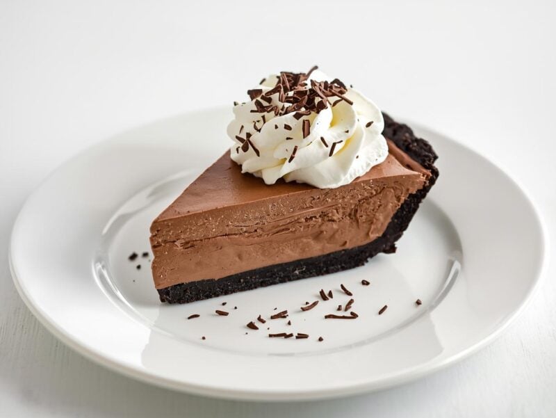 Chocolate cream pie with whipped cream and chocolate shavings for 25 Pie Recipes for Every Occasion